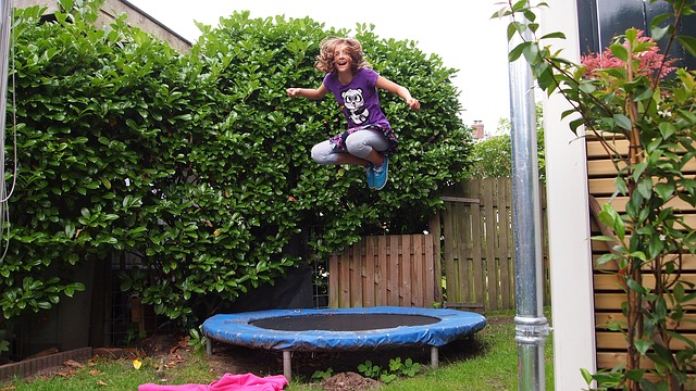 girl- play on trampoline