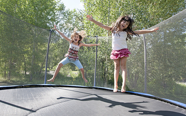 have fun with kid on trampoline