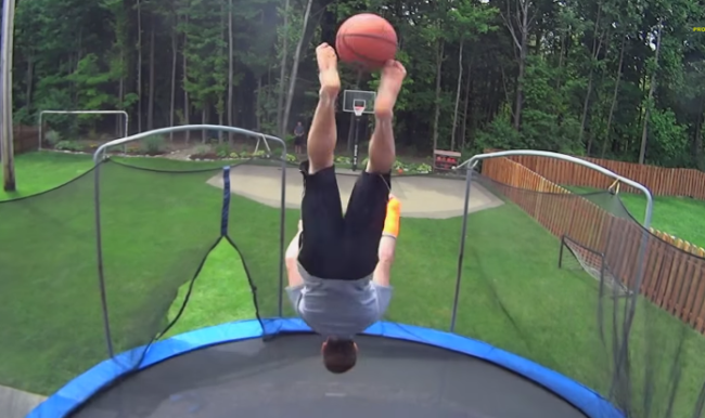 Playing basketball on a trampoline